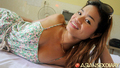 Lying on her side wearing sundress